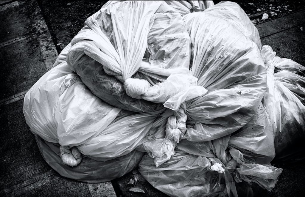 Clear Bags of Trash Piled Up