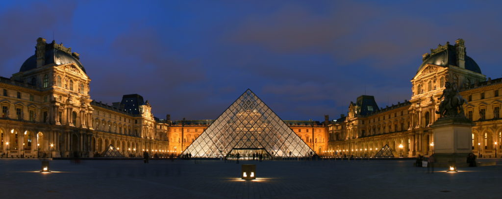 The Louvre outside at night