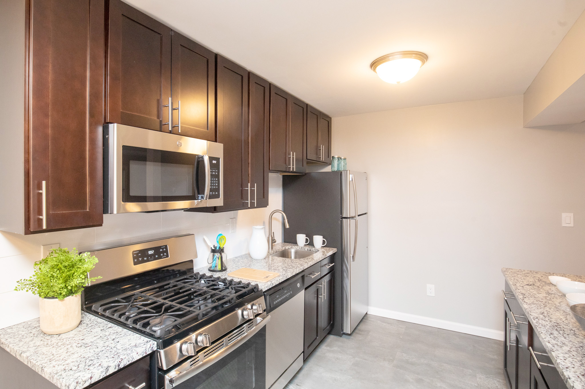 Countertop, new appliances and open space in a kitchen at Millbrook Village