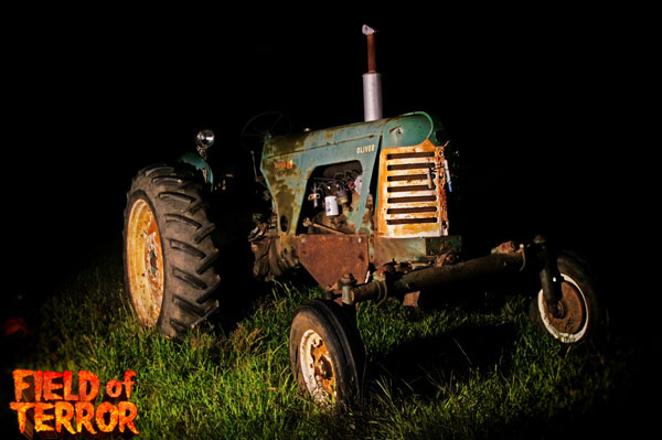 Old rusted tractor at Field of Terror attraction.