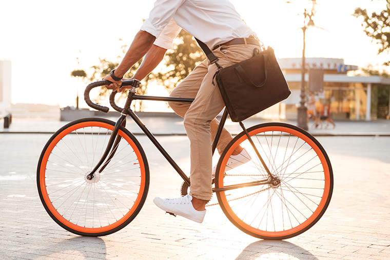 Man riding bike to work from his perfect New Jersey apartment