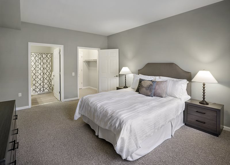 Spacious bedroom with walk in closet at Windsor Woods Apartments.