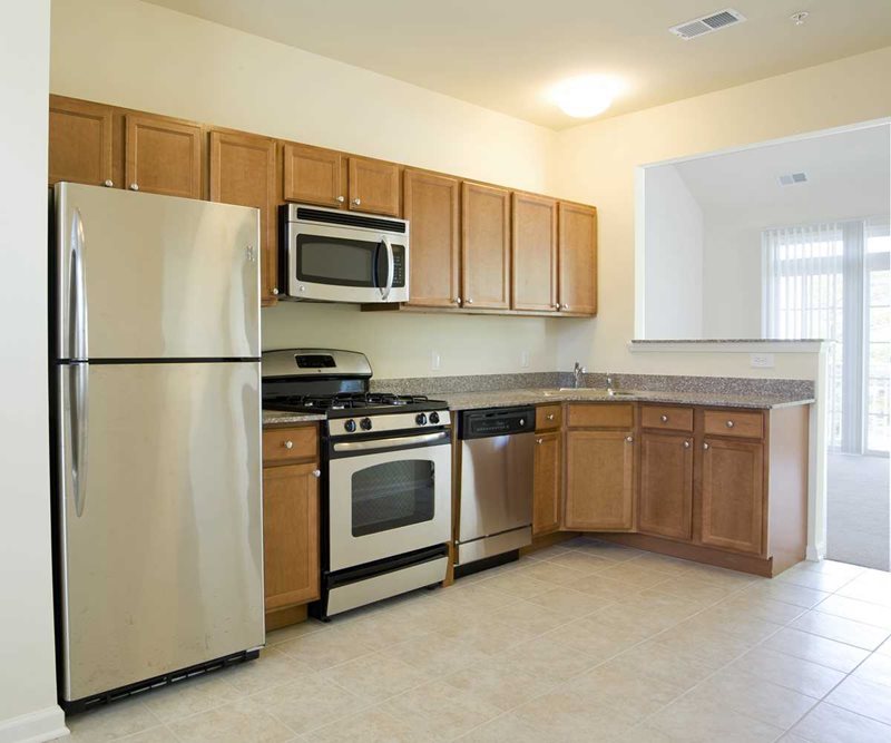Large size kitchen with stainless steel appliances