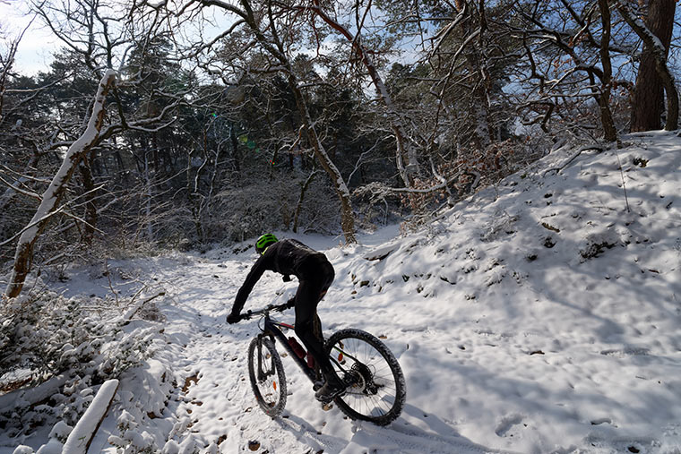 Mountain Biking on snowy trail